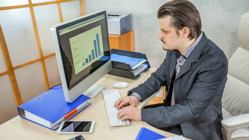 man looking at analytics tool